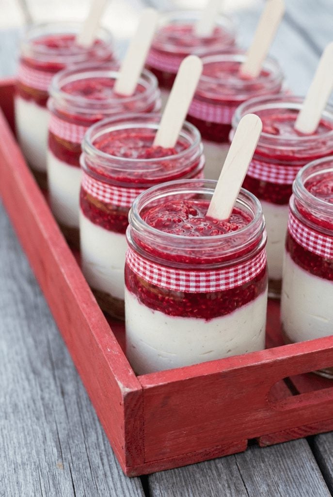 Mini strawberry shortcake jars with whipped cream and mini spoons