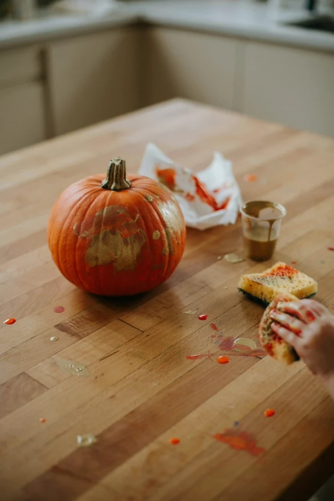 Pumpkin with mottled orange and gold texture created using a sponge
