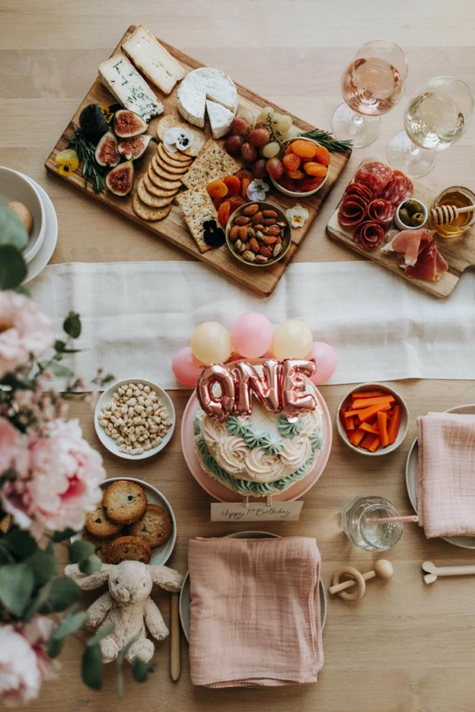 Charcuterie snack board with cheese, crackers, and grapes for guests