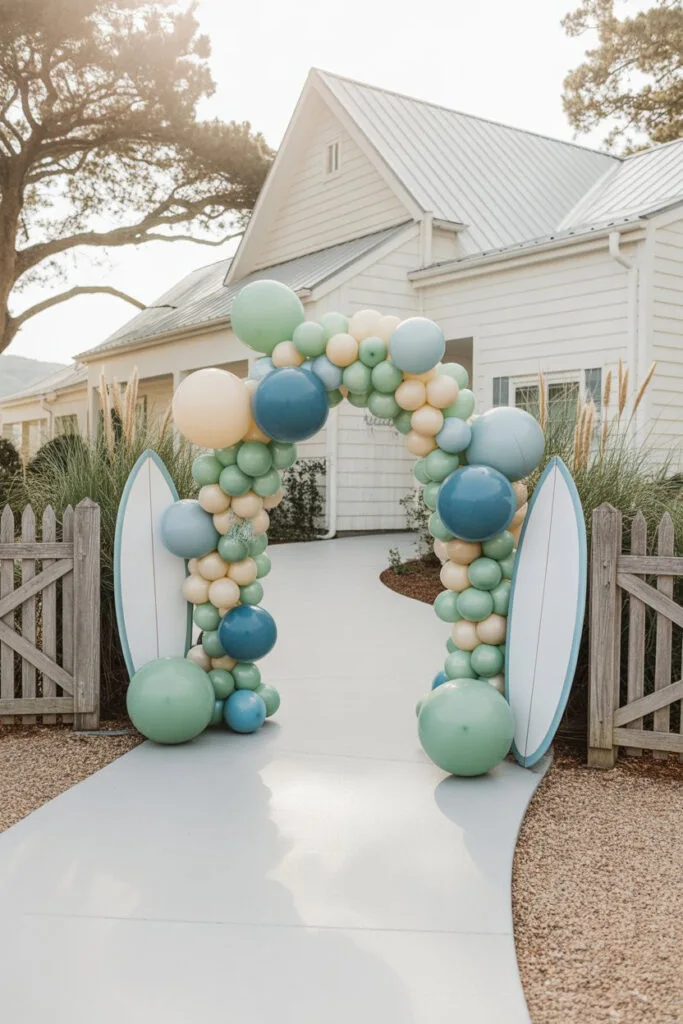 Coastal baby shower decor with soft blues and seashell details