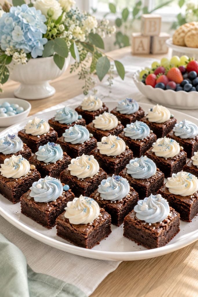Baby shower food: fudgy mini brownie bites on a plate