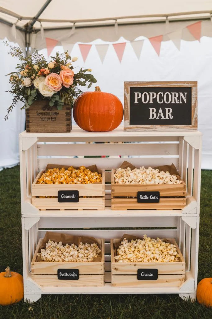 Rustic crate popcorn bar for a fall baby shower