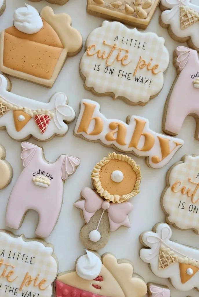A Little Cutie Pie decorated sugar cookies for fall baby shower