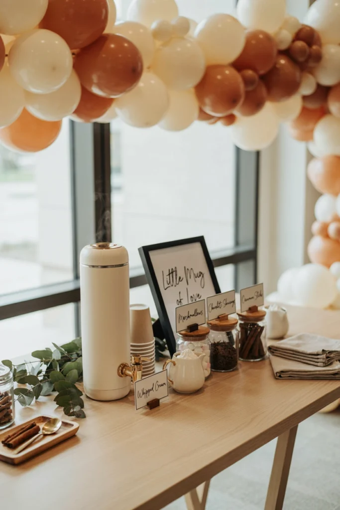 Hot cocoa bar station with marshmallows and cinnamon sticks