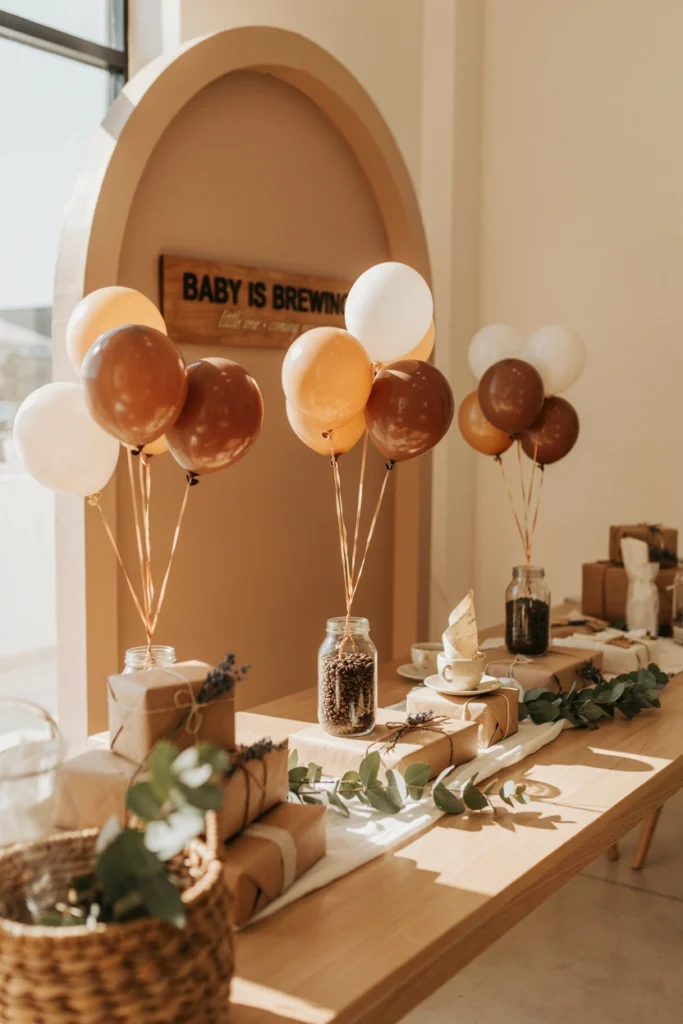 Small balloon cluster weighted with a jar of coffee beans beside a dessert table