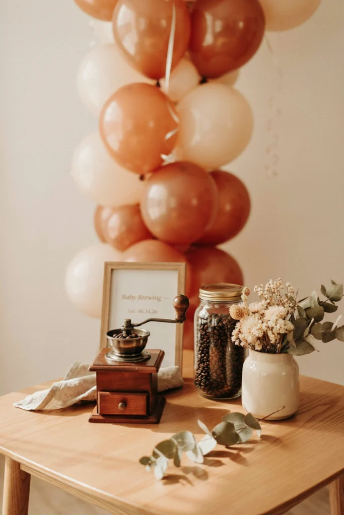 Vintage coffee grinder styled as a photo prop with dried florals