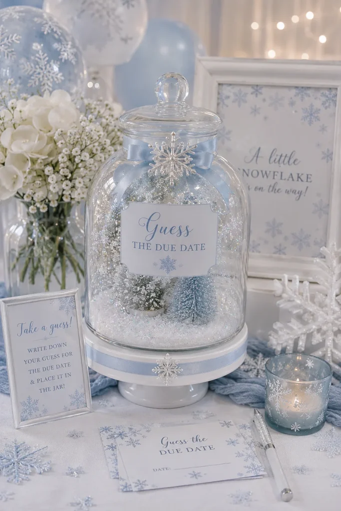 Snow globe jar for guessing the baby's due date at a winter baby shower