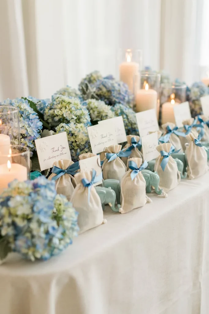 Blue elephant keychain favor bags with thank you cards