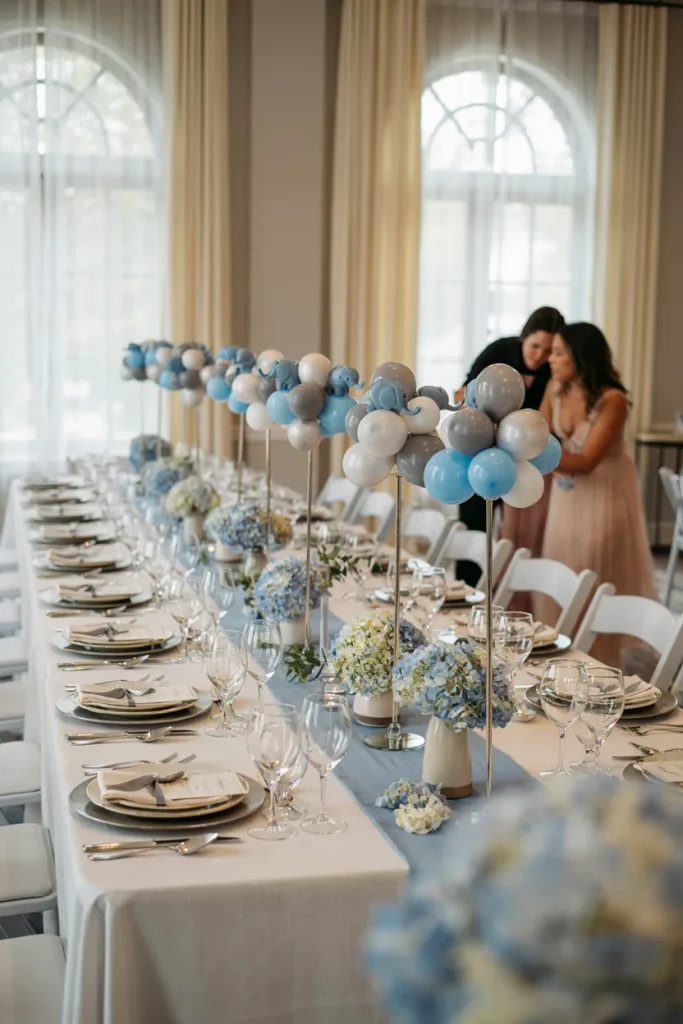 Blue elephant balloon stand centerpieces for baby shower guest tables