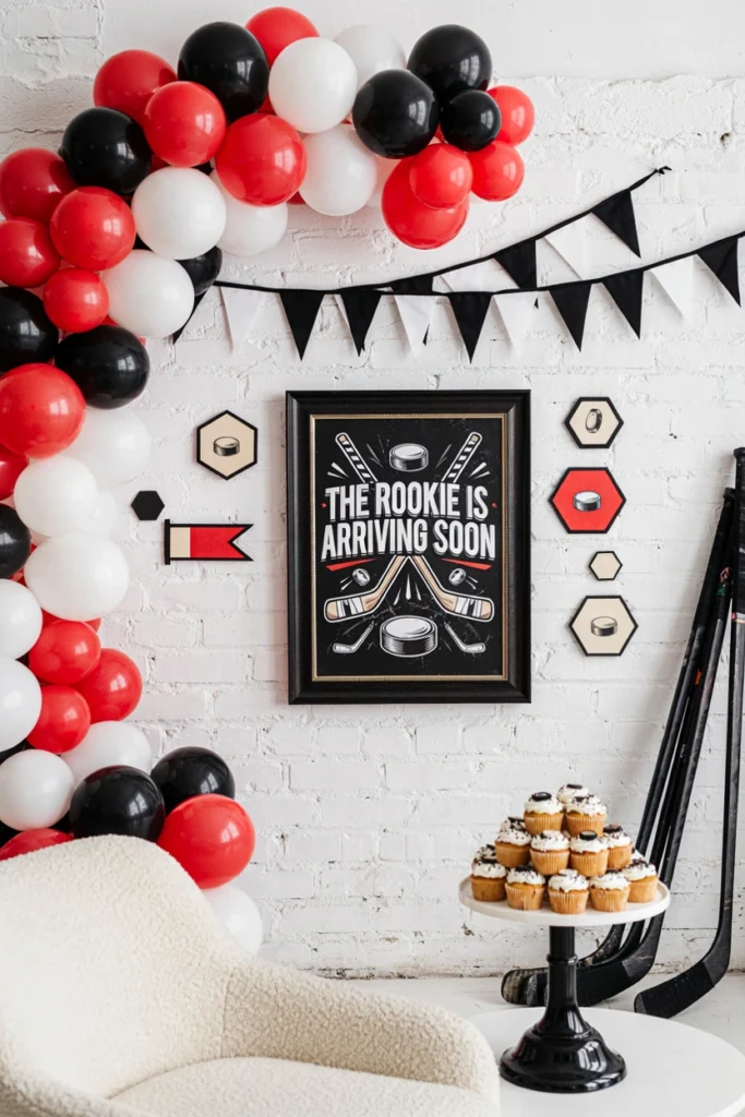 Team-colored photo wall for a hockey baby shower