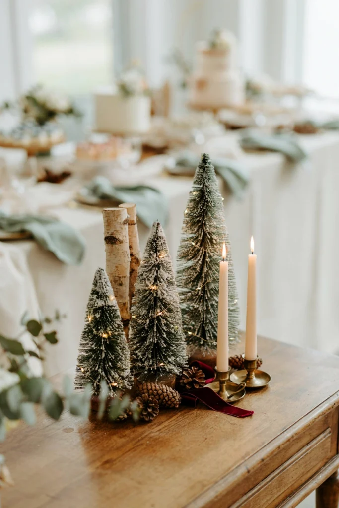 Flocked pre-lit mini Christmas trees as baby shower table decor