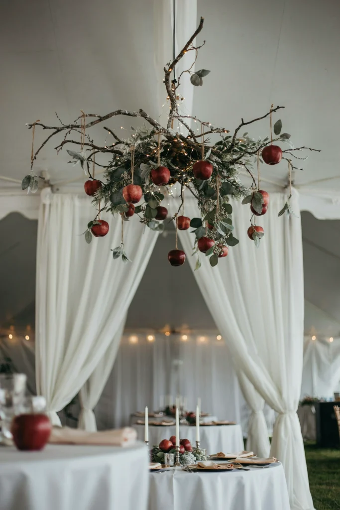 Winter apple orchard chandelier backdrop with string lights