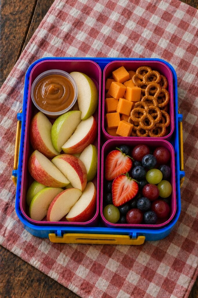 Apple slices around a caramel dip cup