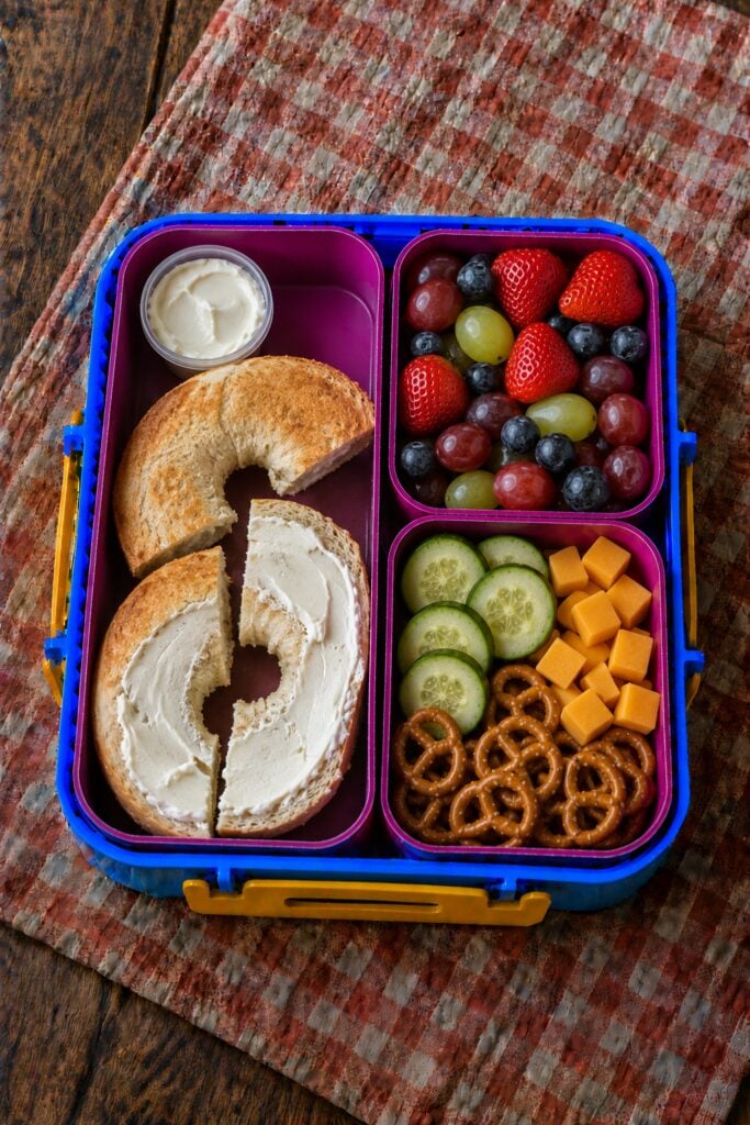 Mini bagel halves with cream cheese