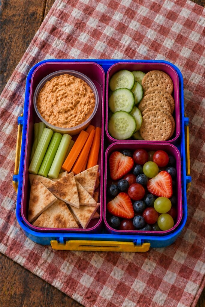 Shredded buffalo chicken dip with celery sticks