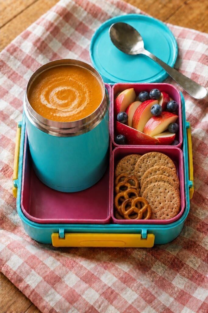 Creamy orange butternut squash soup in a thermos