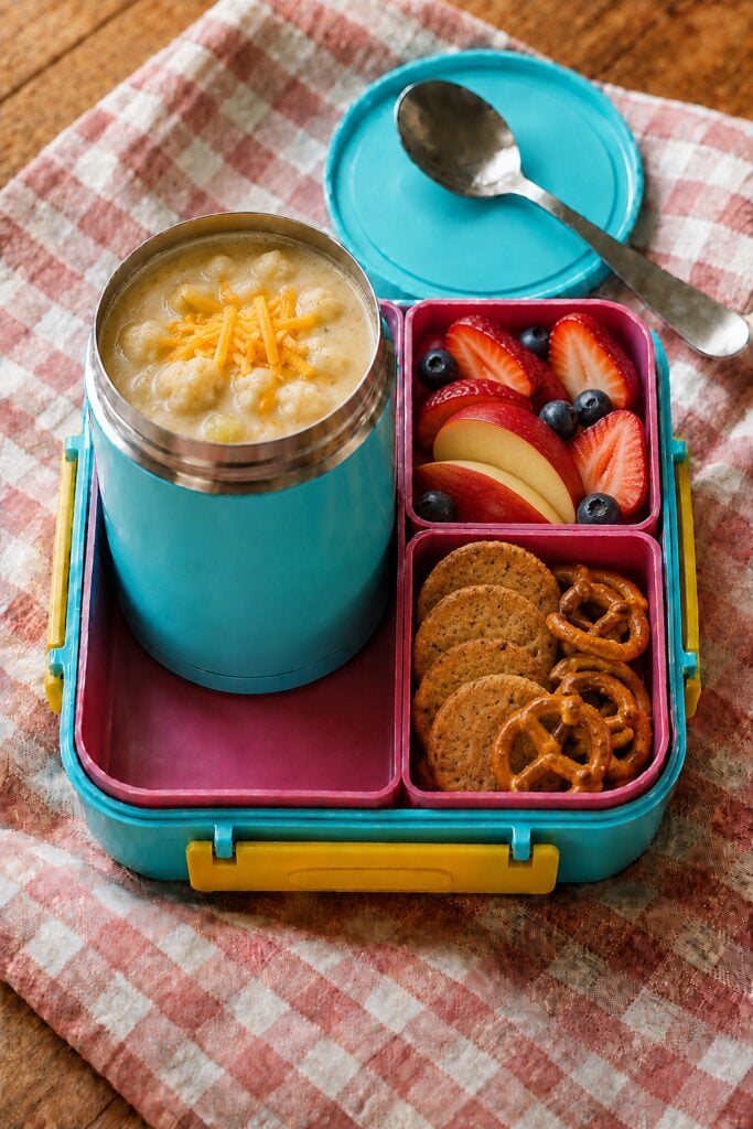 Creamy cauliflower soup with a cheesy swirl in a thermos