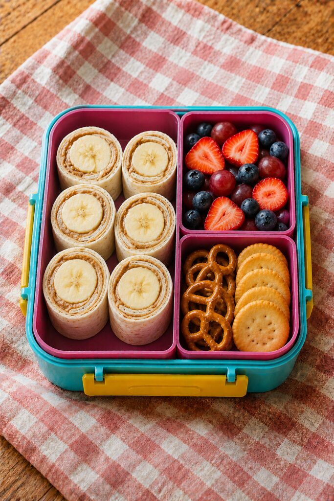 Tortilla rolled with sunbutter and banana, sliced into pinwheels