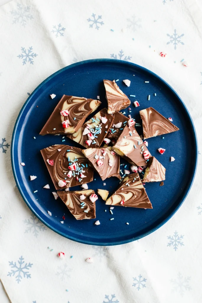 Swirled white and dark chocolate bark topped with crushed peppermint