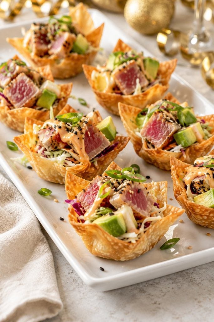 Crisp wonton cups filled with seared tuna, avocado, cabbage, and spicy mayonnaise